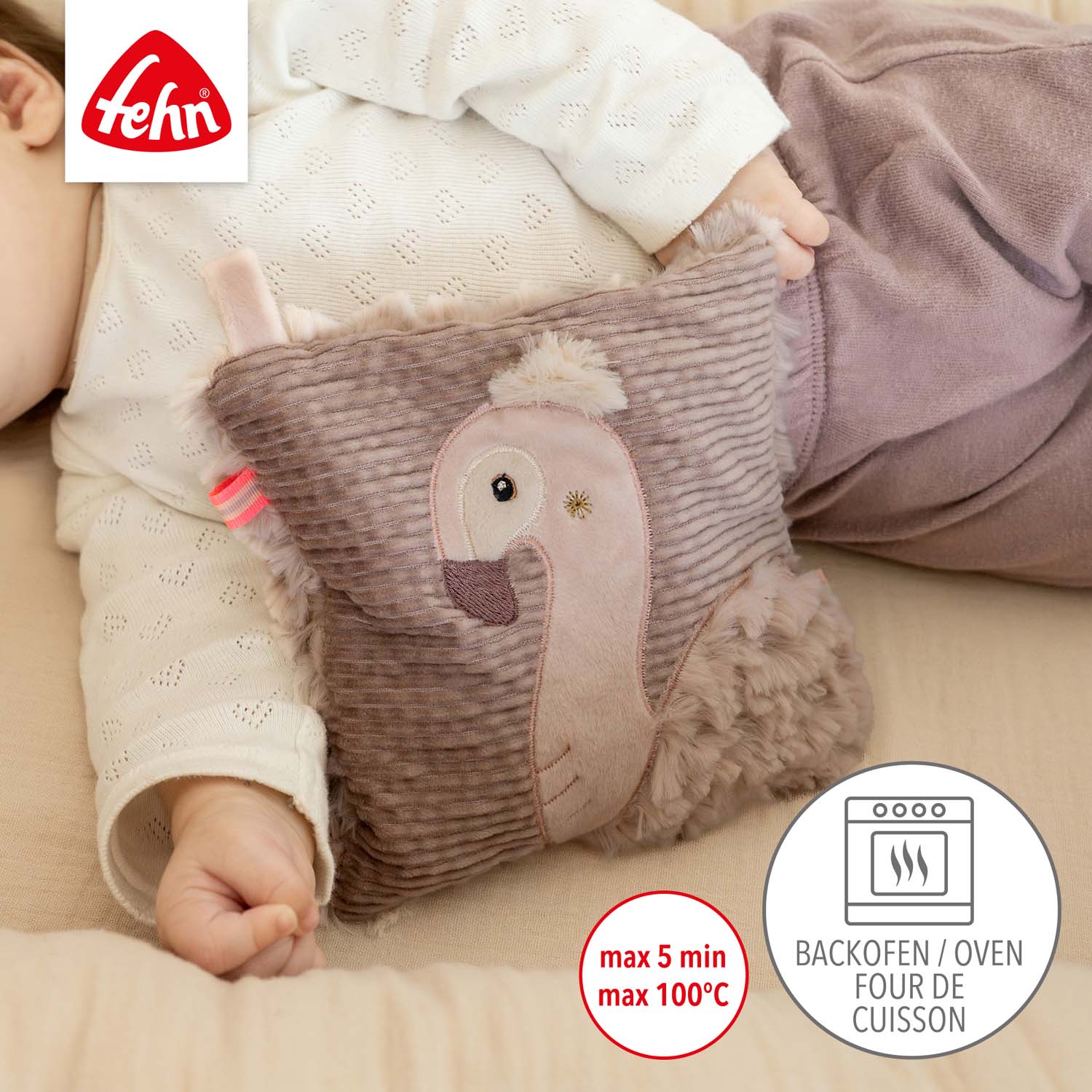 BABY FEHN Nahřívací polštářek plameňák, Pink